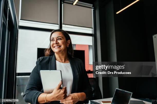 portrait of a business woman in the office - international womens day stock pictures, royalty-free photos & images