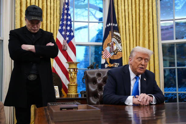 Tesla and SpaceX CEO Elon Musk joins U.S. President Donald Trump during an executive order signing in the Oval Office at the White House on February...