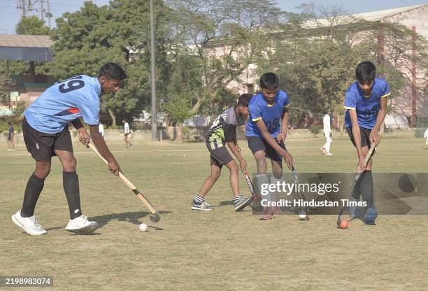 Hockey players seen during district level hockey trials at Mahamaya Stadium on February 14, 2025 in Ghaziabad, India.