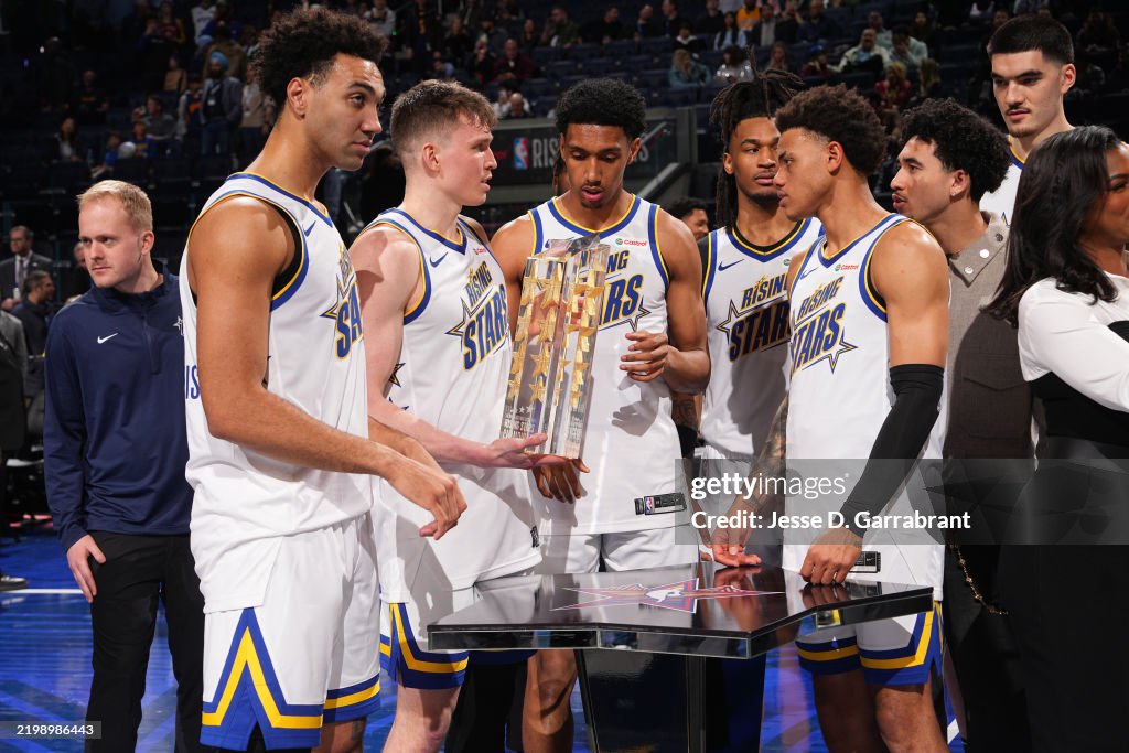 Spring Stars Game Team C is presented with 2025 NBA Rising Stars Game Trophy after the ...