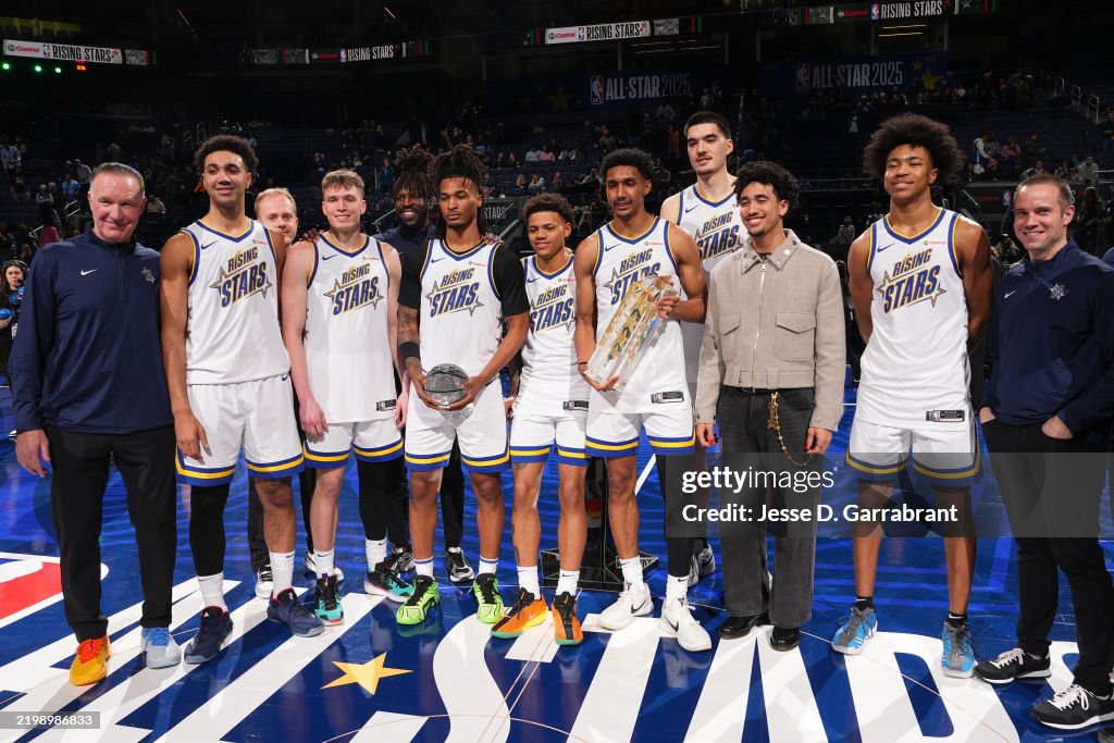 Spring Stars Game Team C is presented with 2025 NBA Rising Stars Game Trophy after the ...