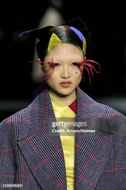Model walks the runway wearing Thom Browne during February 2025 New York Fashion Week on February 11, 2025 in New York City.