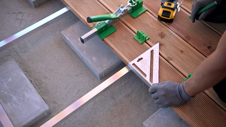 https://media.gettyimages.com/id/2199021205/video/construction-of-wooden-deck-stairs-with-precise-measurements-and-tools-at-a-home-improvement.jpg?b=1&s=640x640&k=20&c=tKT6C9yH8SSa1o-_gfqjpuOPGrdC7ILaSbWxvABuo2Q=