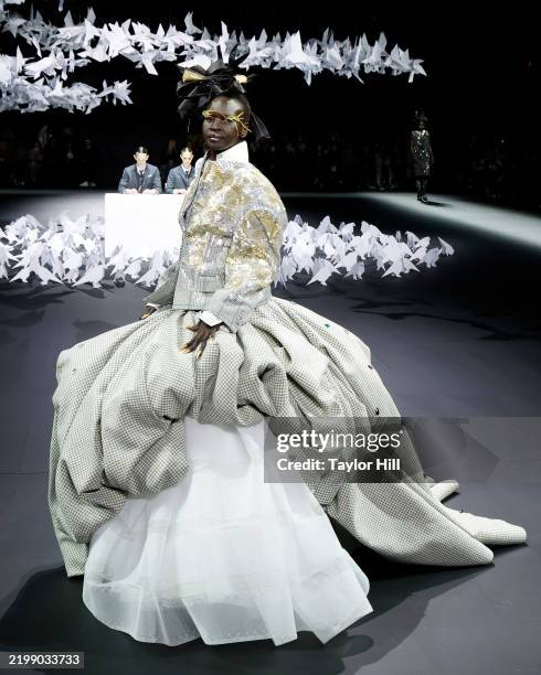 Alek Wek walks the runway during the F/W 2025 Thom Browne fashion show during New York Fashion Week at The Shed on February 11, 2025 in New York City.