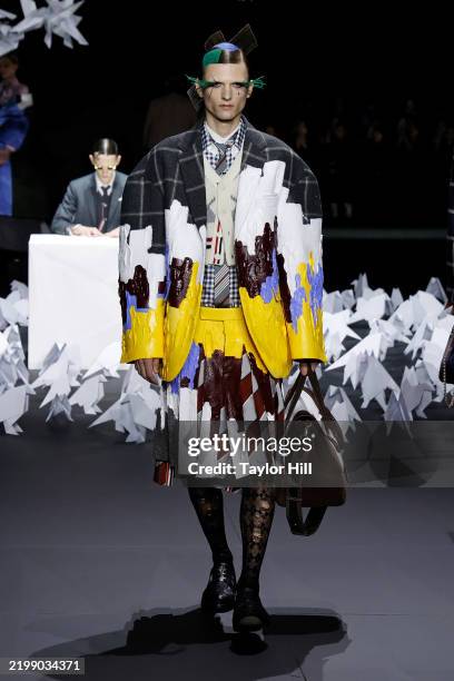 Model walks the runway during the F/W 2025 Thom Browne fashion show during New York Fashion Week at The Shed on February 11, 2025 in New York City.