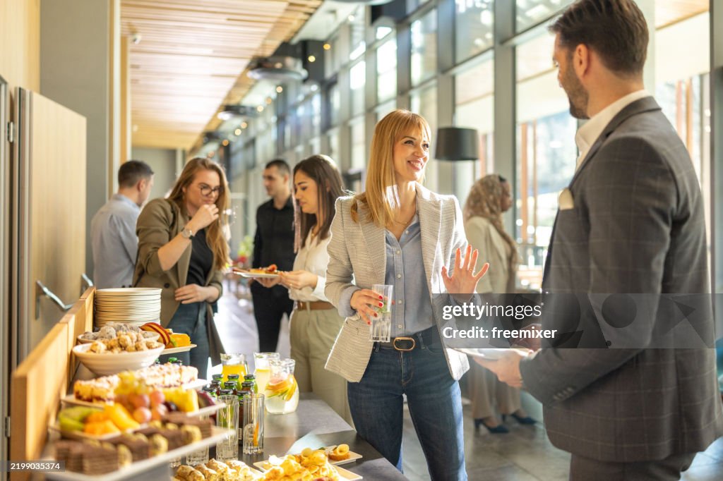Diverse businesspeople during break on seminar