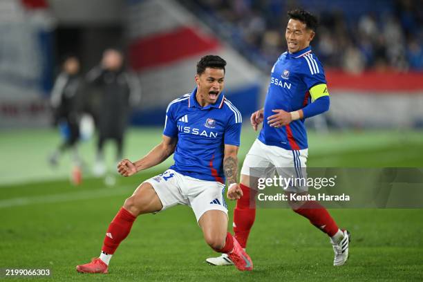 Yan Matheus of Yokohama F.Marinos celebrates with teammate Takuya Kida after scoring the team's first goal during the AFC Champions League Elite East...