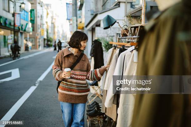 checking out vintage shops in tokyo, japan - shimokitazawa imagens e fotografias de stock