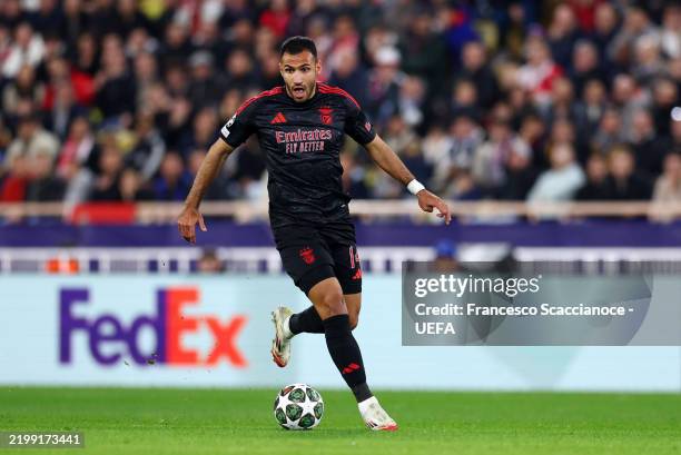 Evangelos Pavlidis of SL Benfica runs with the ball during the UEFA Champions League 2024/25 League Knockout Play-off first leg match between AS...