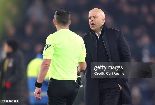 Arne Slot, Manger of Liverpool, shakes hands with Match Referee Michael Oliver following the Premier League match between Everton FC and Liverpool FC...