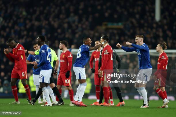 Ashley Young and Jake O'Brien of Everton celebrate after a goal scored by teammate James Tarkowski stands following a VAR review during the Premier...
