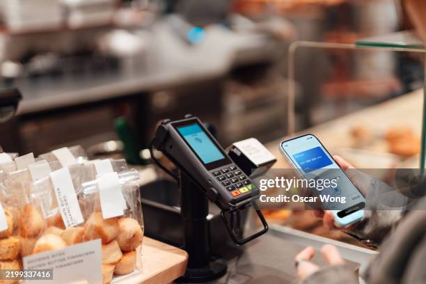 biometric authentication in mobile payments - paypal stock pictures, royalty-free photos & images