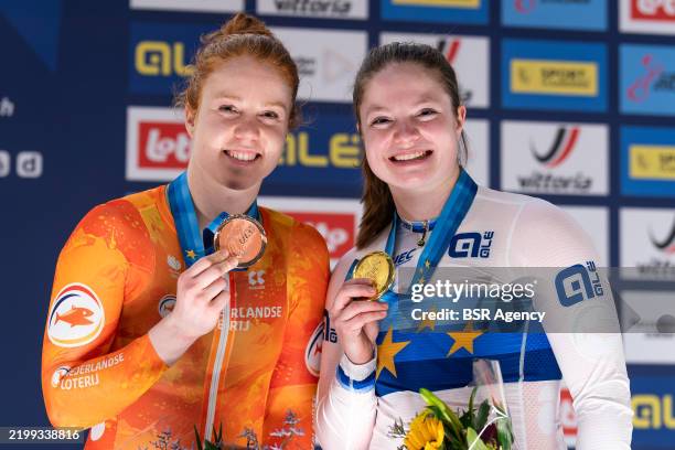Hetty van de Wouw of the Netherlands and Steffie van der Peet of the Netherlands during the podium ceremony during Day Five of the 2025 UEC Track...