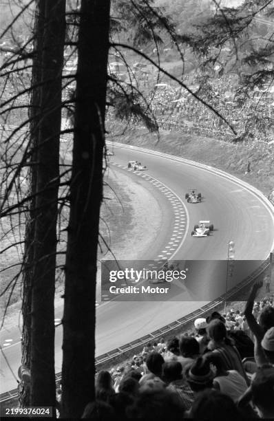 Ronnie Peterson, Lotus 72E Ford leads Denny Hulme, McLaren M23 Ford and Emerson Fittipaldi, Lotus 72E Ford during the Austrian GP, Österreichring,...
