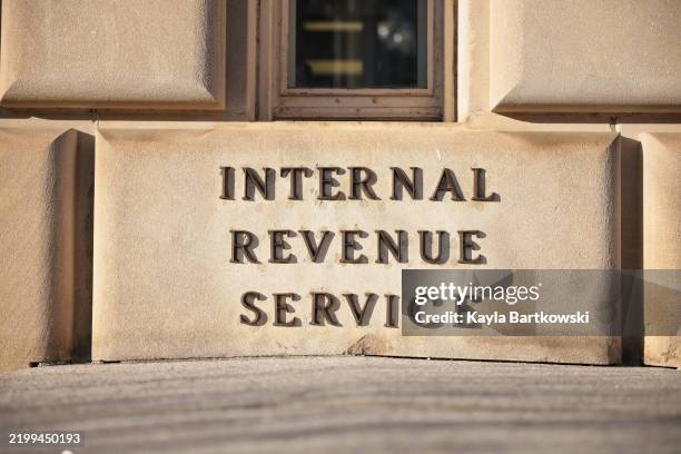 Sign for the Internal Revenue Service is seen on its building on February 13, 2025 in Washington, DC. Members of Elon Musk's Department of Government...