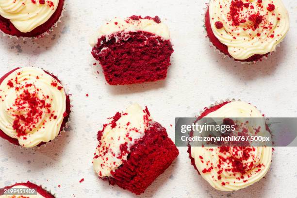 high angle view of cupcakes on table - cupcake stock pictures, royalty-free photos & images