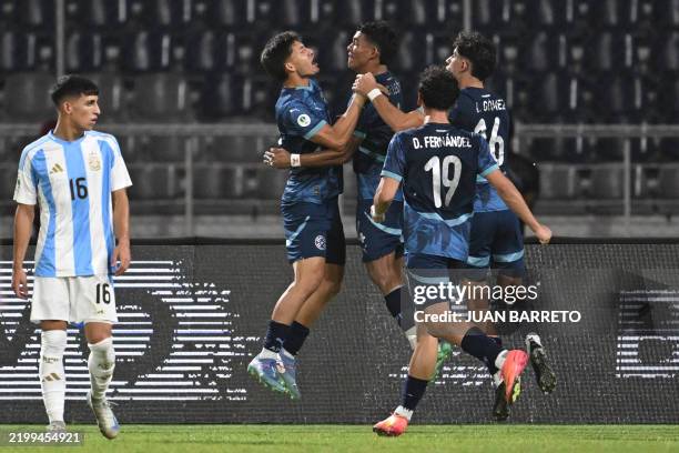Paraguay's defender Diego Leon celebrates with teammates after scoring a goal during the 2025 South American U-20 football championship final round...