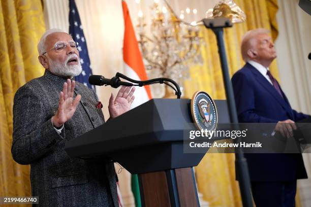 President Donald Trump and Indian Prime Minister Narendra Modi hold a joint press conference in the East Room at the White House on February 13, 2025...