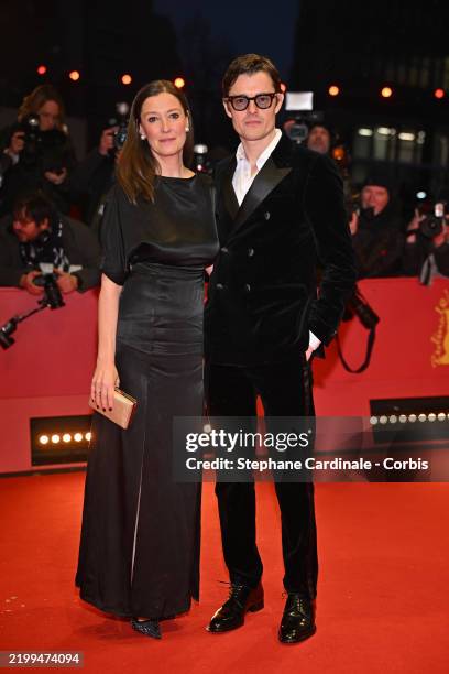 Sam Riley and Alexandra Maria Lara attend the "Das Licht" premiere & Opening Ceremony red carpet during the 75th Berlinale International Film...