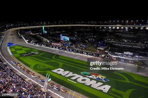 Chase Briscoe, driver of the Bass Pro Shops Toyota leads the field to start the NASCAR Cup Series Duel 1at Daytona International Speedway on February...