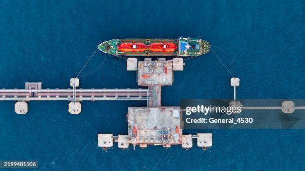 aerial top view tanker at the sea port. - tanker stockfoto's en -beelden