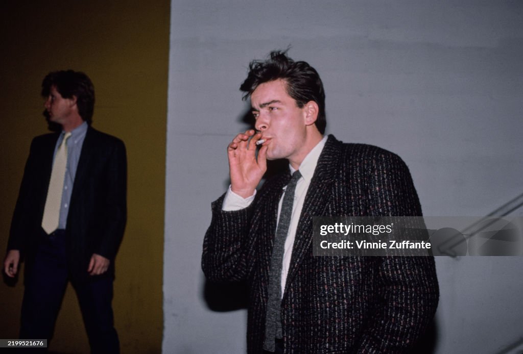 charlie sheen cigarette commercial Actor smokes his as he poses for a portrait... News Photo charlie sheen cigarette ad GIF