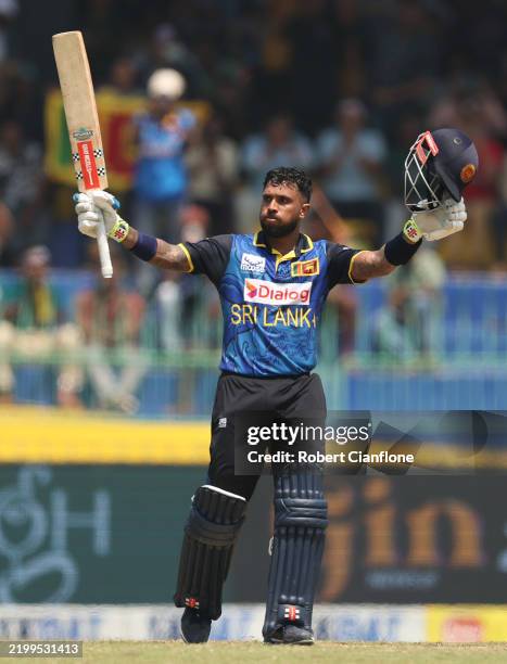 Kusal Mendis of Sri Lanka celebrates after scoring a century during the ODI match between Sri Lanka and Australia at R. Premadasa Stadium on February...