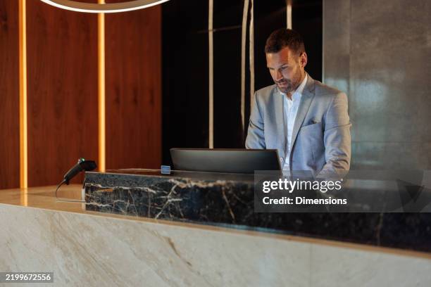 Hotel Receptionist Job Using Computer 710 Information Desk Hotel Stock Photos, High-Res Pictures, and Images ...