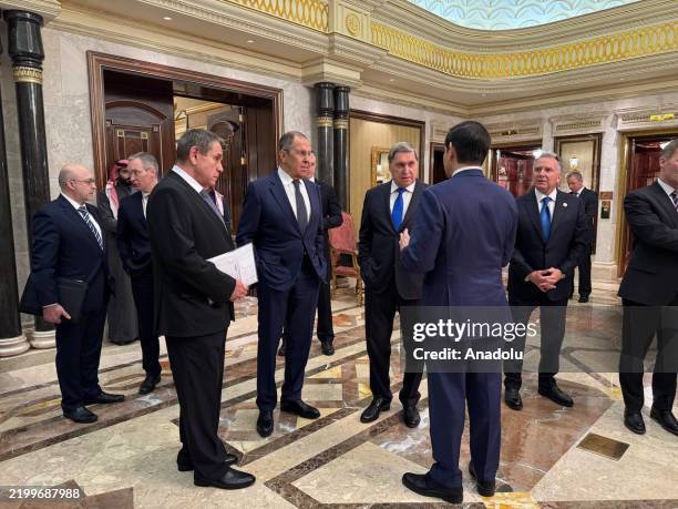 Russian Foreign Minister Sergey Lavrov and Russian President Vladimir Putin's Foreign Policy Advisor Yuri Ushakov chat with Saudi Arabian officials,...