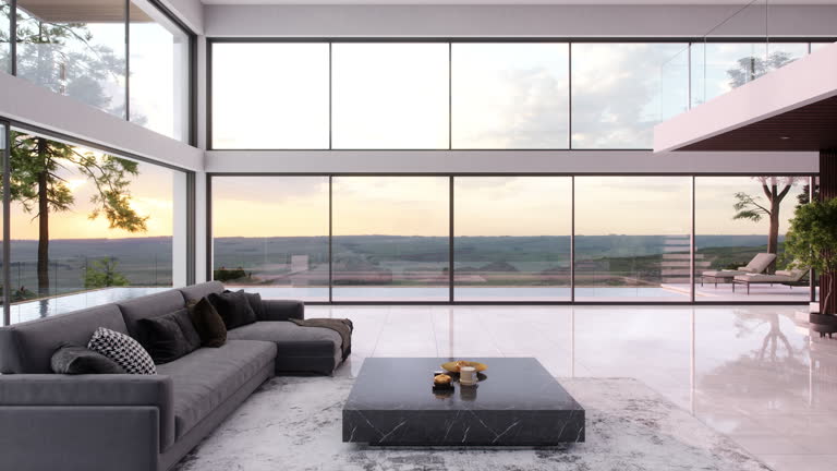 https://media.gettyimages.com/id/2199706239/video/contemporary-interior-with-large-glass-windows-and-sunset-view.jpg?b=1&s=640x640&k=20&c=xgXytFiUx60pYLib7XzDdwfkpOWFNRtpbDOo01fpK6Q=