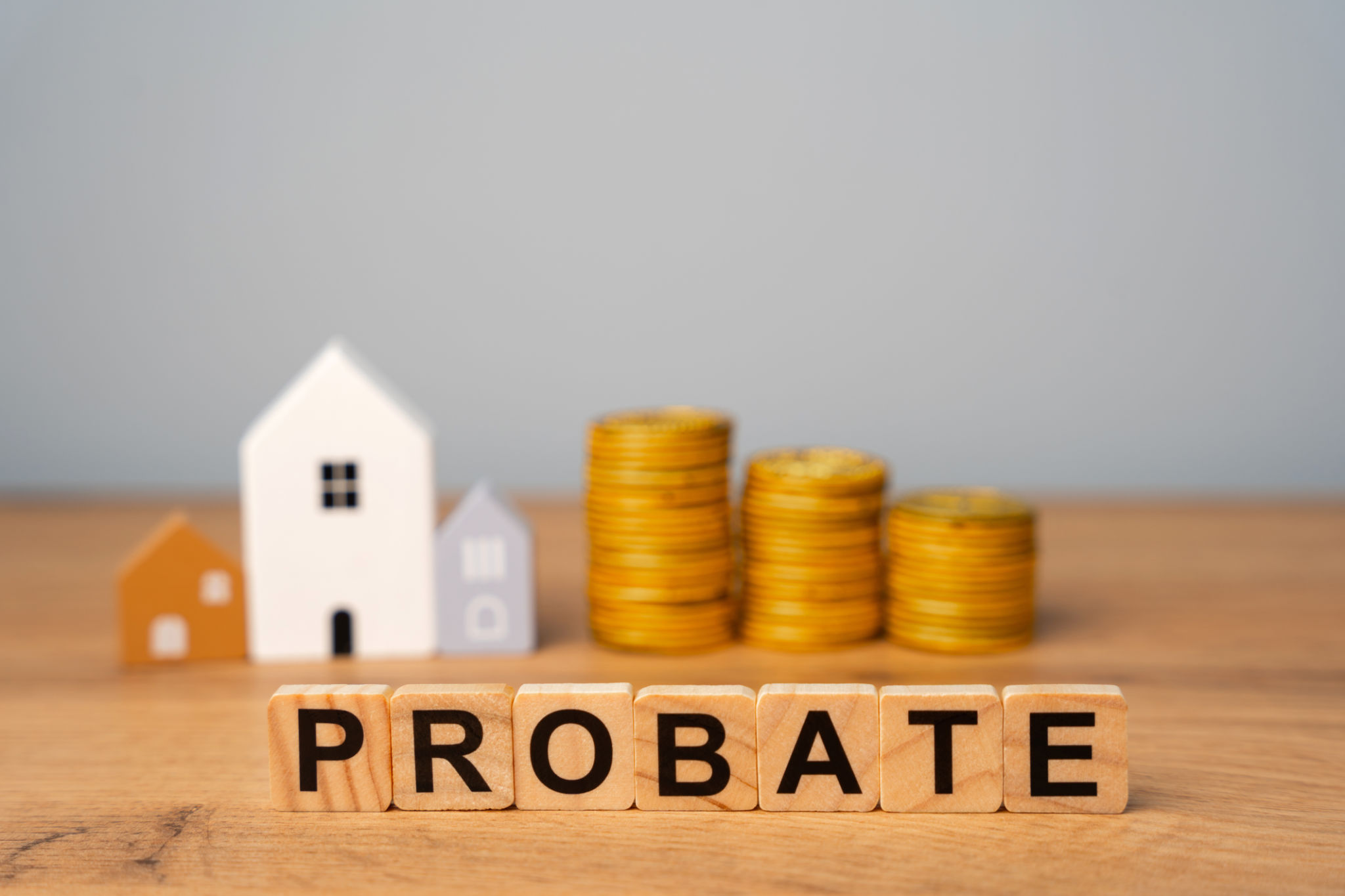 Real estate that is part of a deceased person's estate and managed or distributed through the probate process. Wooden blocks Probate and miniature houses. Real estate that is part of a deceased person's estate and managed or distributed through the probate process. Wooden blocks Probate and miniature houses.