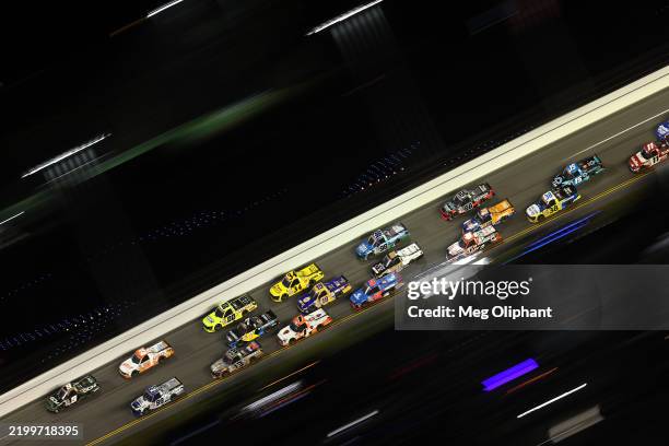 Grant Enfinger, driver of the Grant County Mulch Chevrolet and Ben Rhodes, driver of the Clark's/SantaHill Ranch/ToyonRanch Ford lead the field...