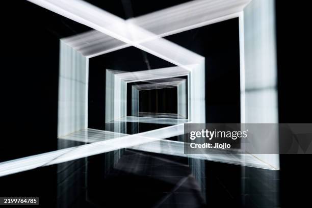 futuristic corridor with blurred motion light - ineinander verschlungen stock-fotos und bilder