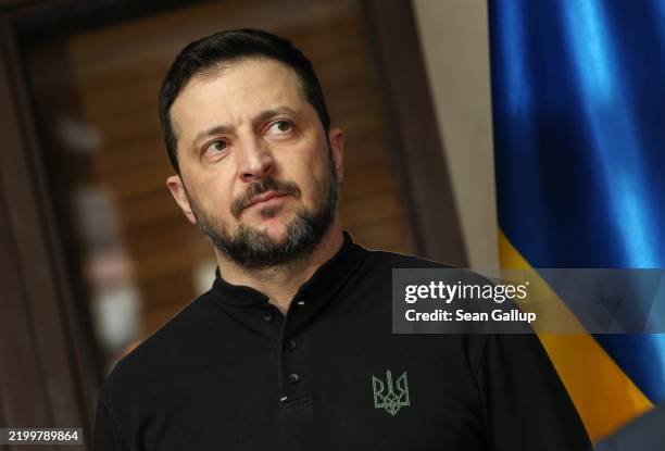 Ukrainian President Volodymyr Zelensky arrives to meet with German Chancellor Olaf Scholz at the 61st Munich Security Conference on February 15, 2025...