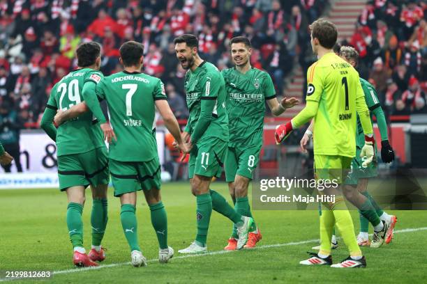 Tim Kleindienst of Borussia Moenchengladbach celebrates scoring his team's second goal with teammates during the Bundesliga match between 1. FC Union...