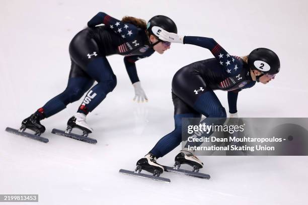 Corinne Stoddard of United States wins the silver medal and Kristen Santos-Griswold of United States wins the gold medal as they compete in the Women...