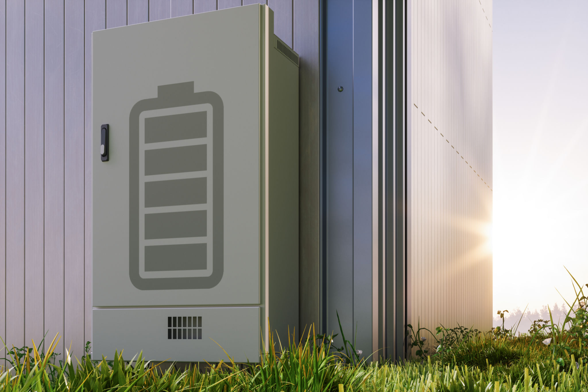 Close-up Of Home Battery Storage System Mounted On Building Facade With Sunlight Background Close-up Of Home Battery Storage System Mounted On Building Facade With Sunlight Background