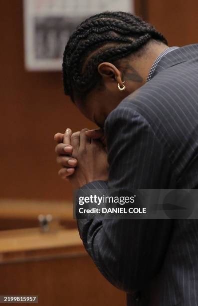 Rakim Mayers, aka A$AP Rocky, listens as the verdict is read in his felony assault trial at the Clara Shortridge Foltz Criminal Justice Center in Los...