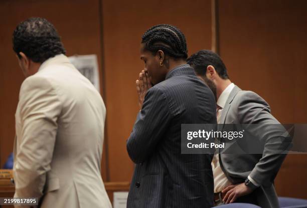 Rakim Mayers, aka A$AP Rocky, reacts in court as the verdict is given in his felony assault trial at Clara Shortridge Foltz Criminal Justice Center...