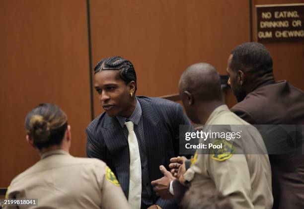 Rakim Mayers, aka A$AP Rocky, reacts in court as the verdict is given in his felony assault trial at Clara Shortridge Foltz Criminal Justice Center...