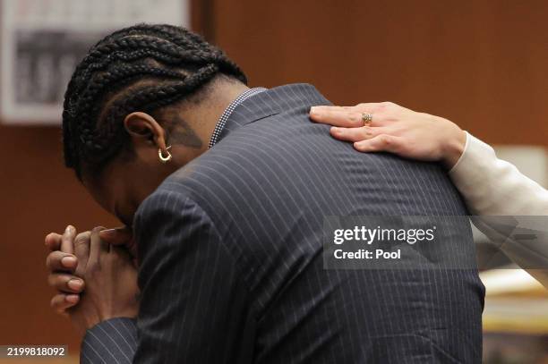 Rakim Mayers, aka A$AP Rocky, reacts in court as the verdict is given in his felony assault trial at Clara Shortridge Foltz Criminal Justice Center...