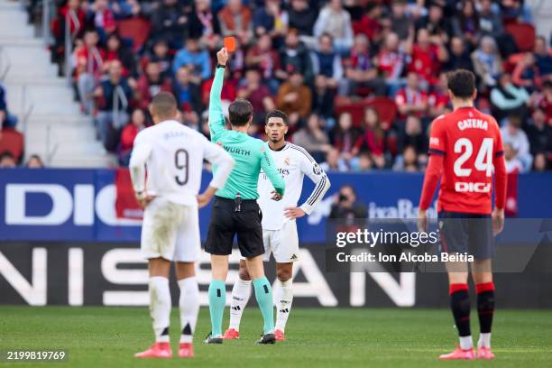 Jude Bellingham of Real Madrid CF receives a red card during the LaLiga EA Sports match between CA Osasuna and Real Madrid CF at Estadio El Sadar on...