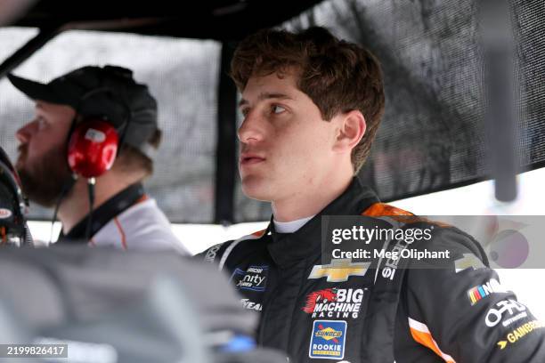 Nick Sanchez, driver of the Big Machine Vodka Spiked Coolers Chevrolet looks on during qualifying for the NASCAR Xfinity Series United Rentals 300 at...