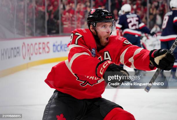 Connor McDavid of Team Canada celebrates after scoring during the first period of the 4 Nations Face-Off game between the United States and Canada at...