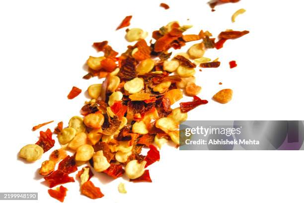 chilli flakes - chilli seeds stock pictures, royalty-free photos & images