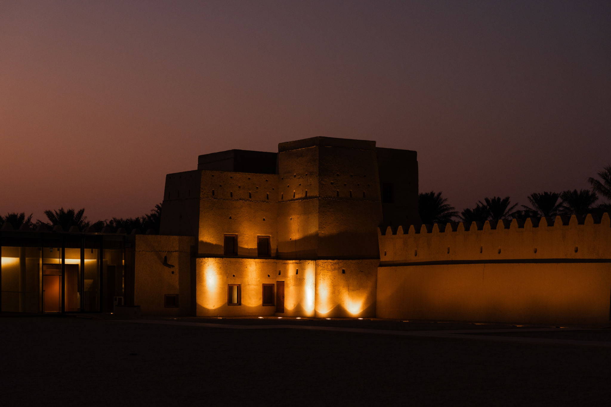 Sheikh abdullah bin jassim al thani palace glowing at dusk in doha, qatar Sheikh abdullah bin jassim al thani palace glowing at dusk in doha, qatar
