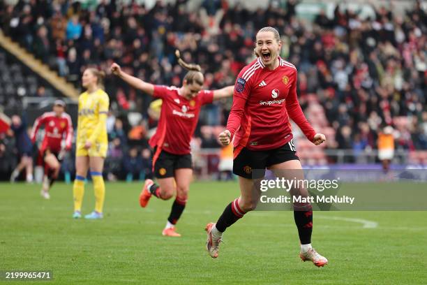 Elisabeth Terland of Manchester United celebrates scoring her team's second goal during the Barclays Women's Super League match between Manchester...
