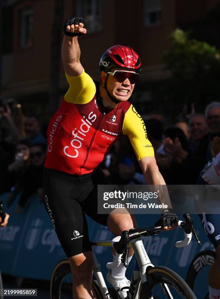 Milan Fretin of Belgium and Team Cofidis celebrates at finish line as race winner during the 38th Clasica de Almeria 2025 a 189.1km one day race from...