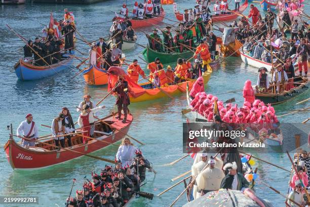 Venetians dressed up in carnival masks to take part in the Carnival regatta on the Grand Canal on February 16, 2025 in Venice, Italy. The Venice...