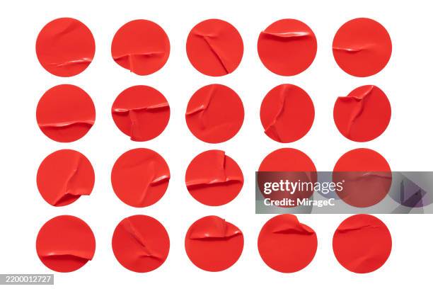 red creased round stickers with folds isolated on white - sticker stock pictures, royalty-free photos & images